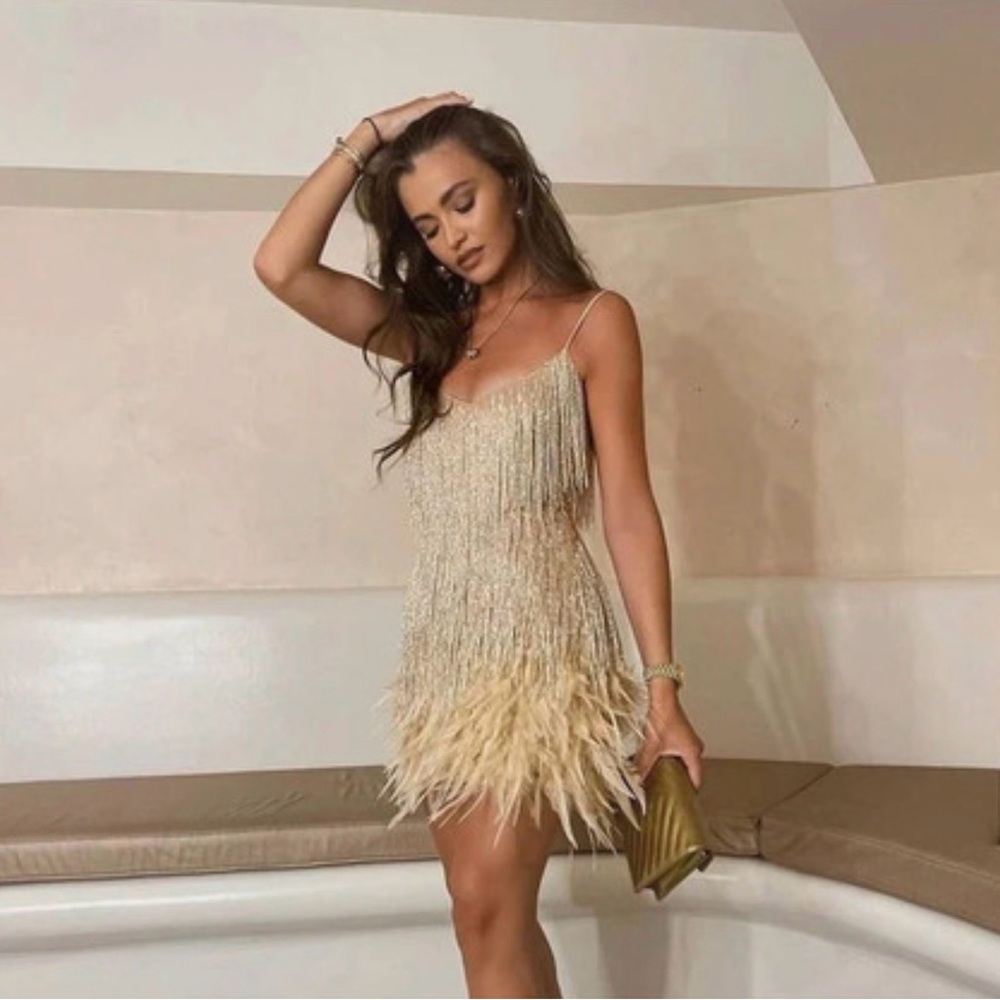 NADINE MERABI LOTTIE DRESS with sequins and feather Mini Dress in Champagne.